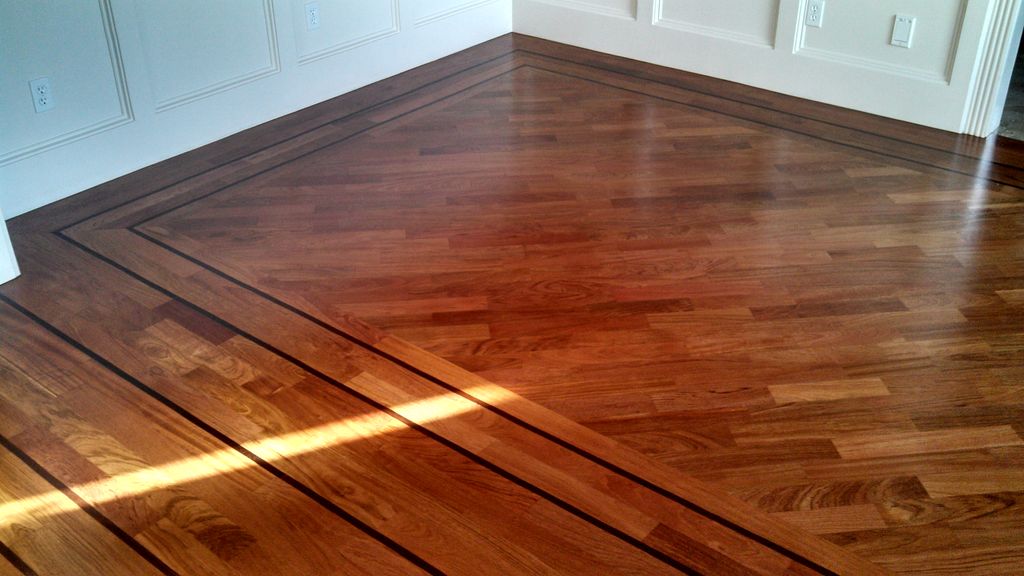 Brazilian Cherry with black walnut inlays.