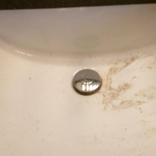 Rusted bathroom sink before