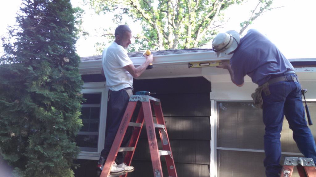 Installing seamless rain gutters to compliment thi