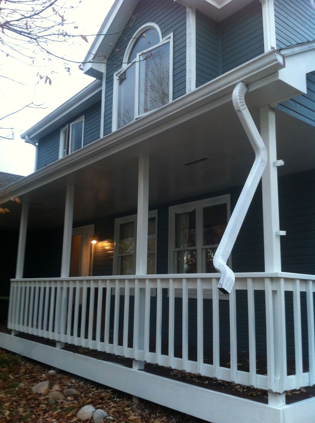 Repaired rotten window sills and siding, painted e