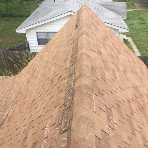 Marked up roof with damage. Ready for an insurance