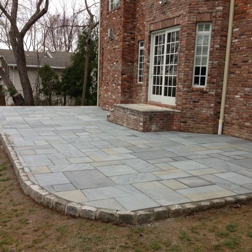 Elevated Blue Stone Patio bordered in Belgian Bloc