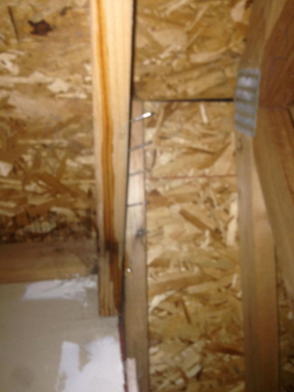 The downspout terminated directly above this point