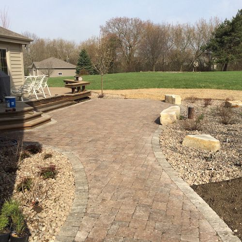 Paver patio with new beds