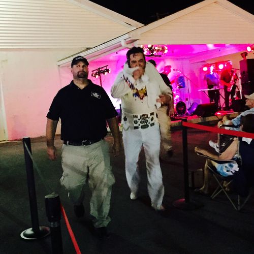 Security at the Carnival 2015
Escorting Elvis--loo