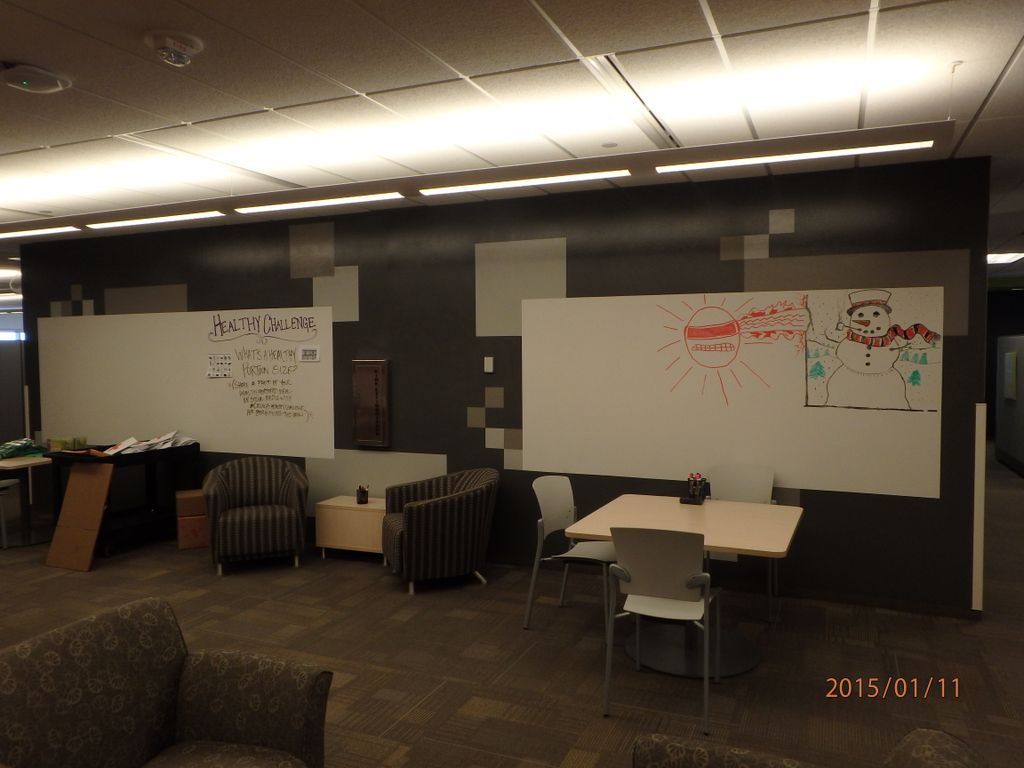 A full wall in a commercial space that is covered 