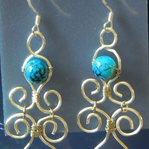 Silver wire wrapped turquoise stone earings.