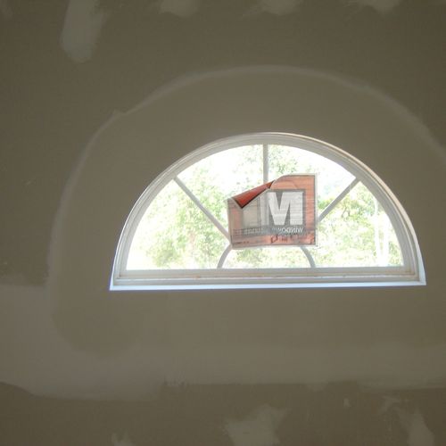 this is a new half arch window with arch bead .