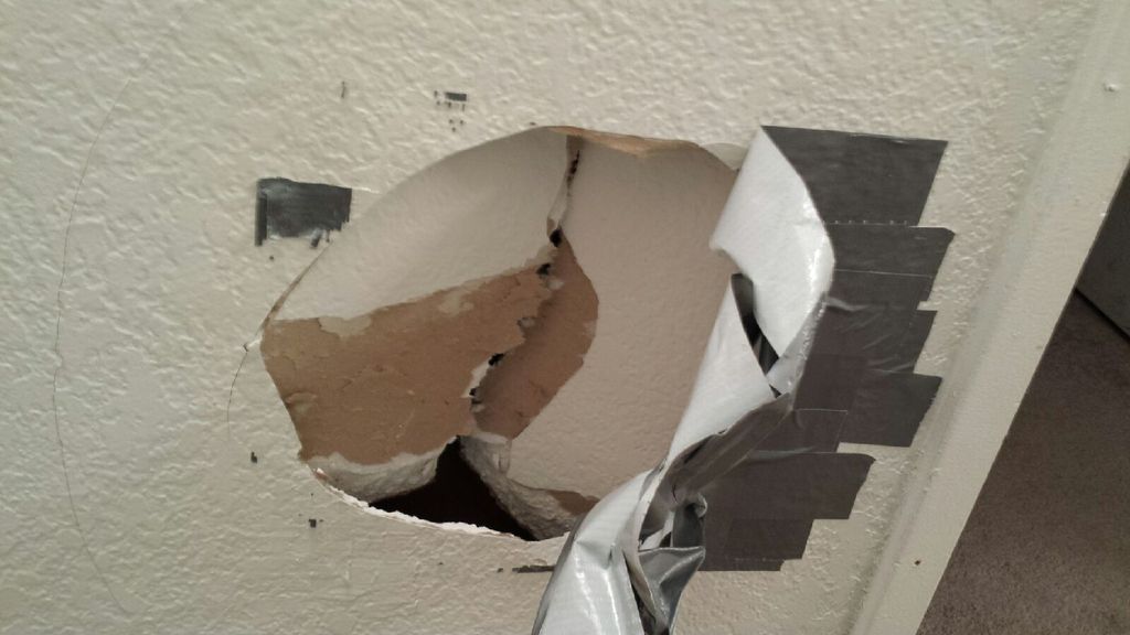 Patched, textured and painted hole in drywall