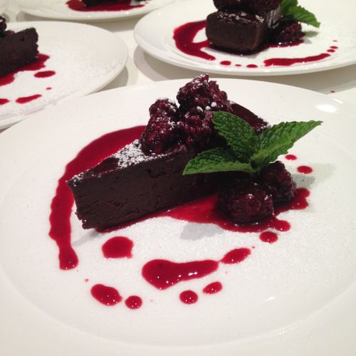 Flourless chocolate cake and blackberry compote