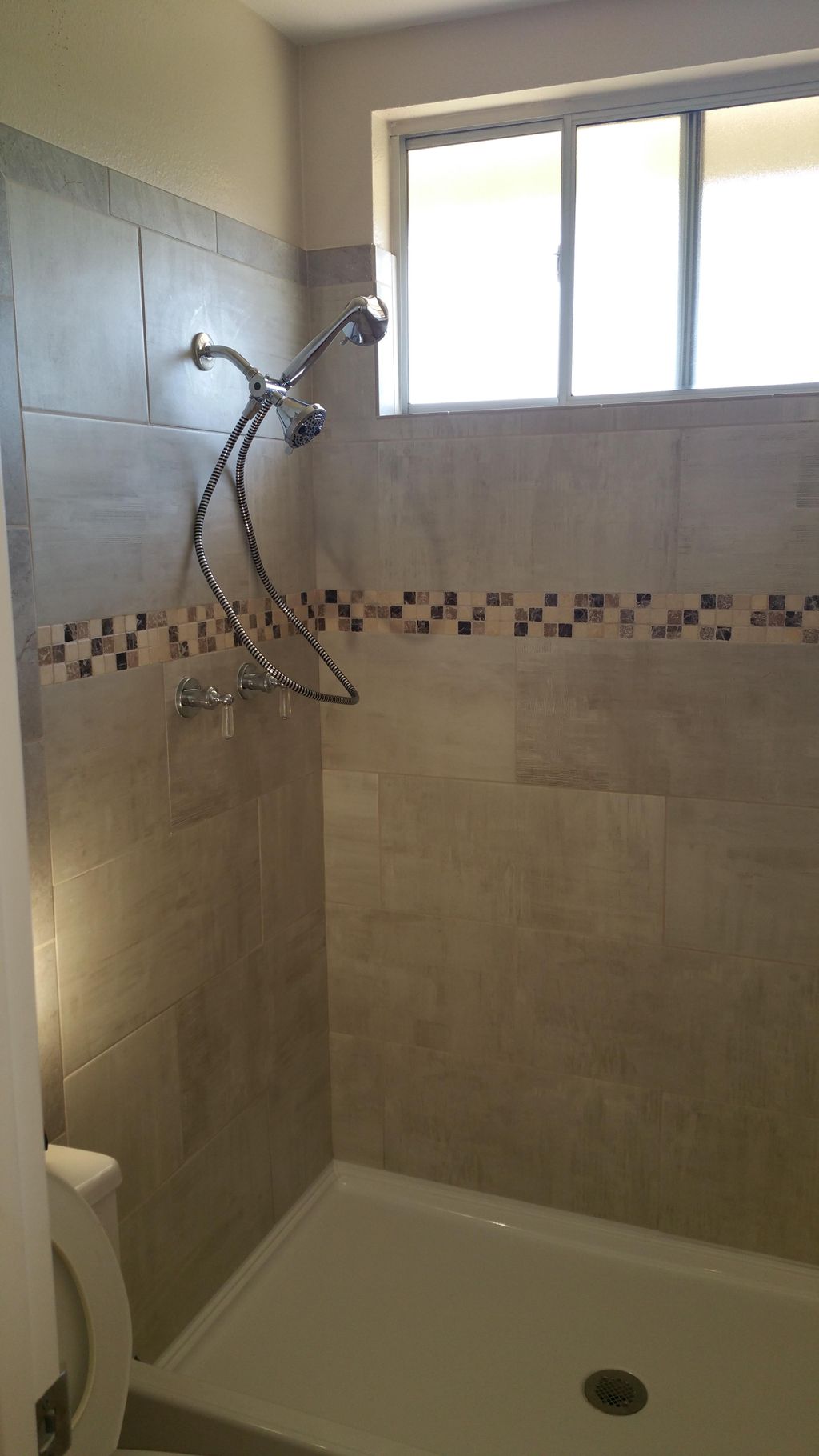 A simple shower remodel.  Went from old white tile