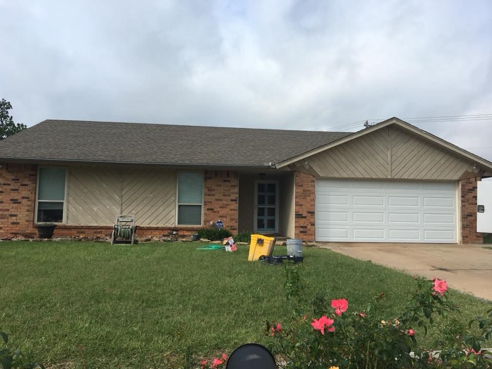 BEFORE Exterior home repaint.