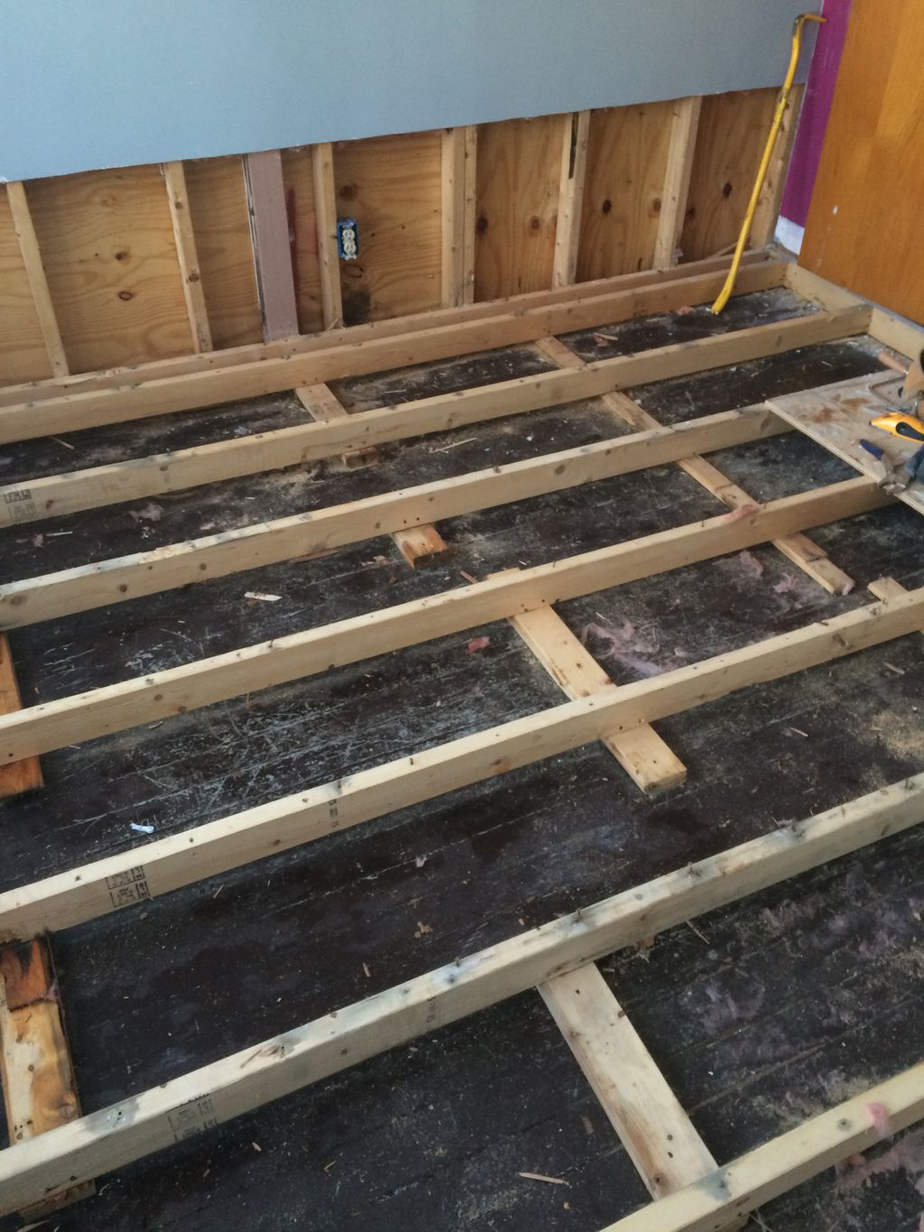 Demo of subfloor, wall, and removal of wet insulat