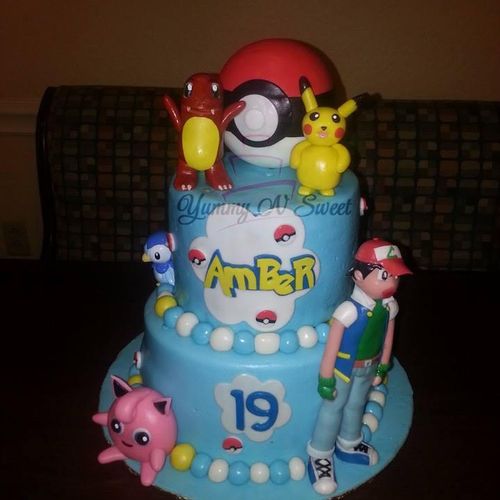 2 tier Pokemon Cake w/ edible figures