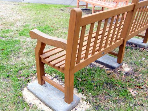 Teak bench after repair and refinishing