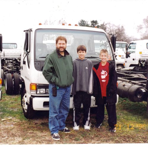 Picking out my truck in 1999 with my sons.