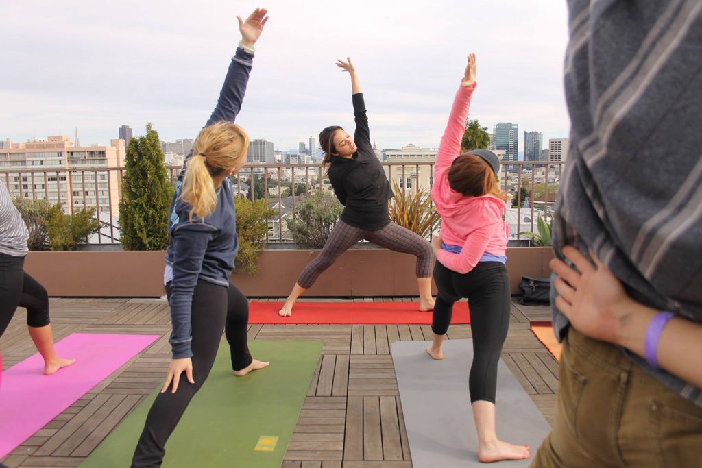 Teaching a rooftop yoga at the NOW! Festival in Sa