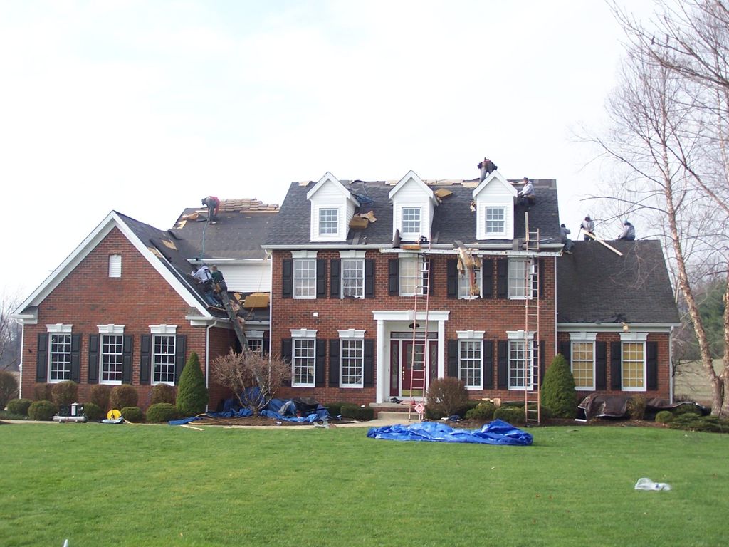 Guys working hard to perfect this homeowners new r