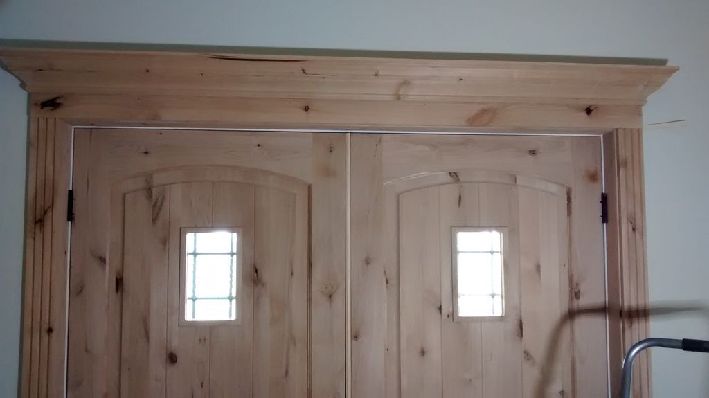 Alder trim on entryway doors home in Sperry 2016
