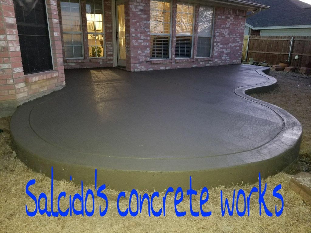 Completed patio and a happy client