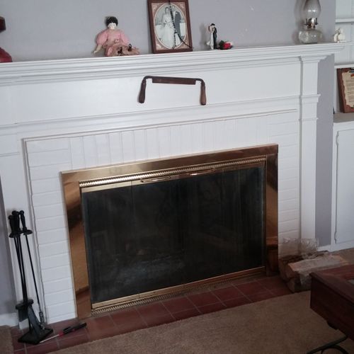 A Painted fireplace, mantel and bookcase that was 
