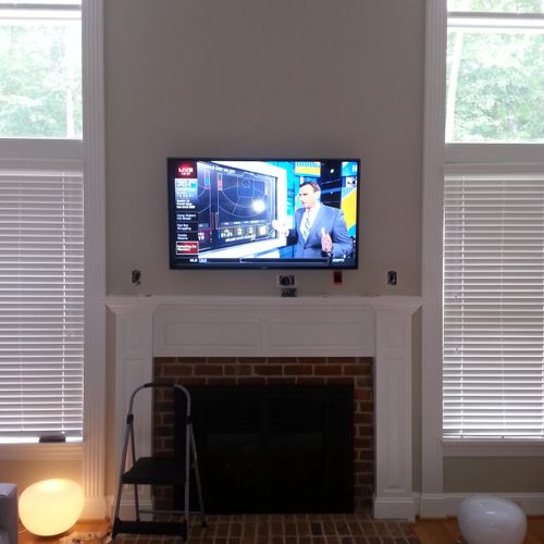 Mounted TV and ran conduit on outside of home.  Th