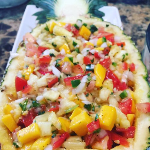 Pineapple mango salsa served with tortilla chips