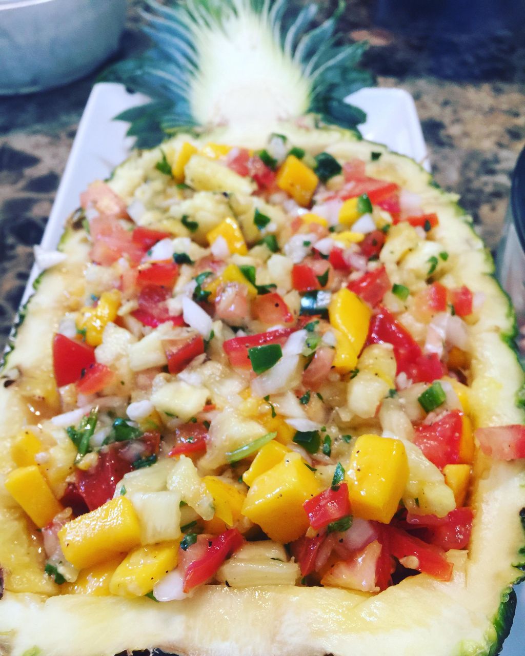 Pineapple mango salsa served with tortilla chips