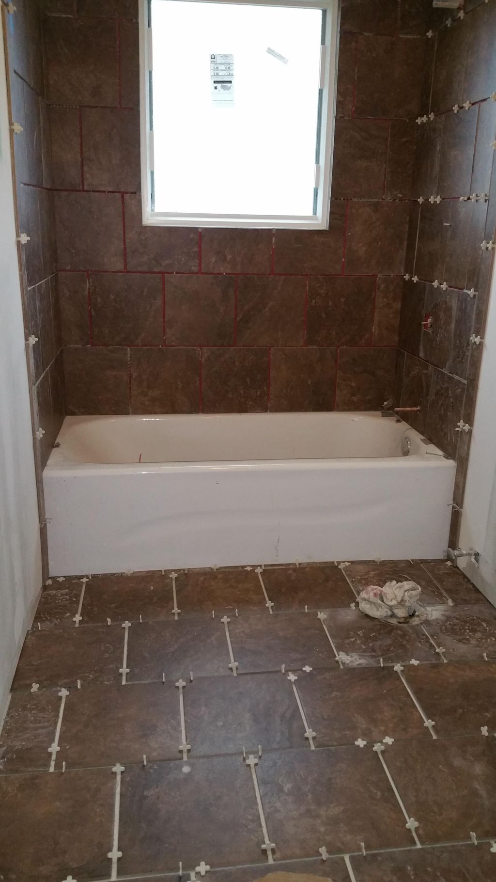 Tile shower surround for this newly remodeled bath
