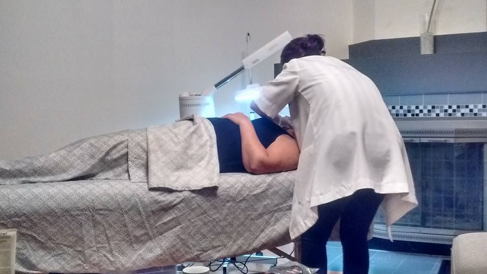 Working on a customer at her home