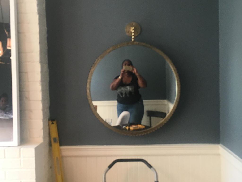 a 70 lb fine art mirror which is mounted just from