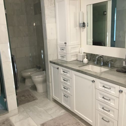 The cabinets in this bath were custom built for th