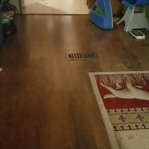 330 spft. laminate job in a living room, t-mold an