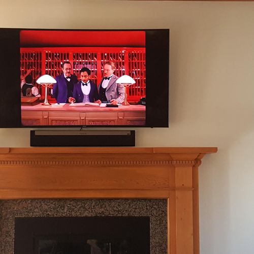 Residential TV mount with Sonos Sound bar installe