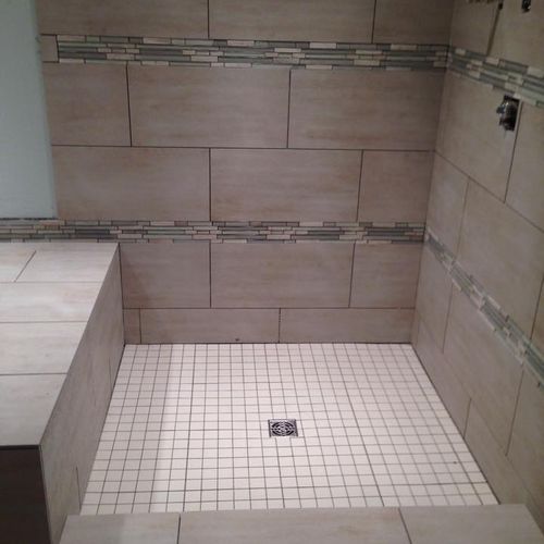 12x24 porcelain tile with 2x2 mosaic in shower flo