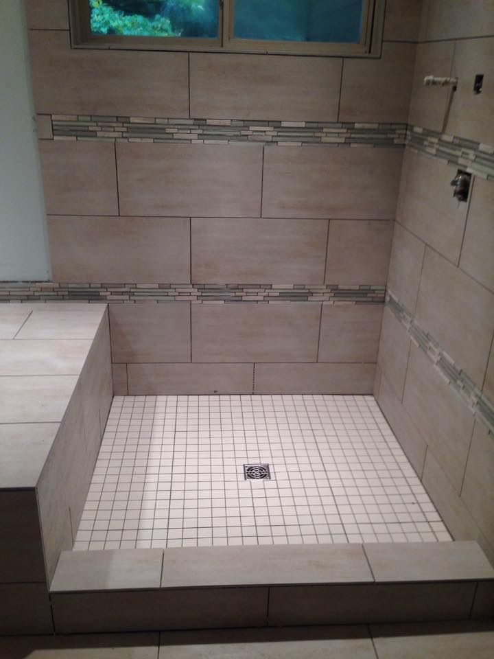 12x24 porcelain tile with 2x2 mosaic in shower flo