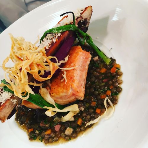 sauteed salmon over lentils. topped with roasted b
