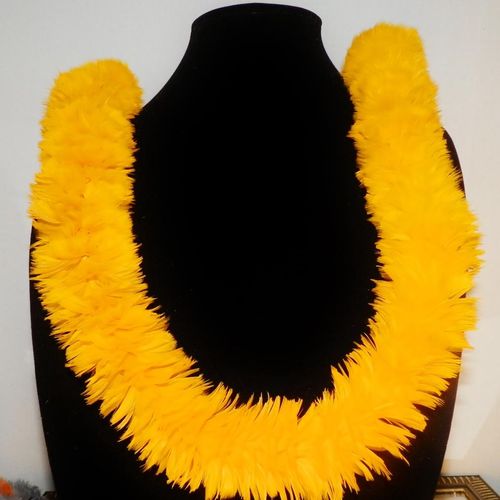 Queen Kaahumanu feather lei in royal ilima (carrot