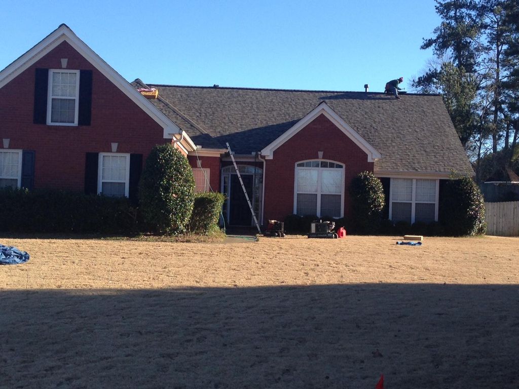 Upon completion of new roof installation.