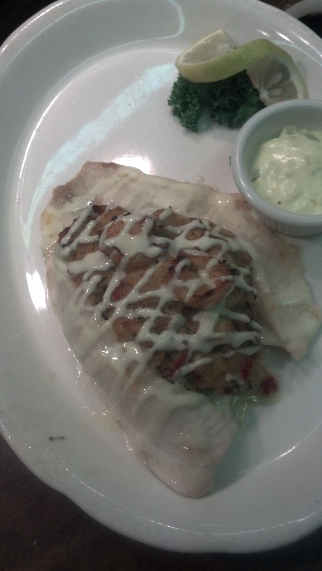 Shrimp stuffed Tilapia with lemon creme sauce.