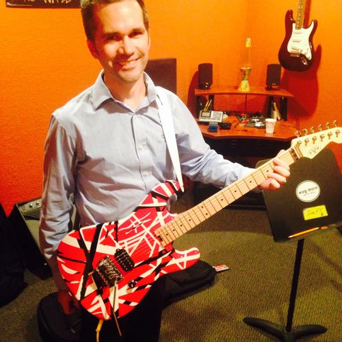 SMA student with his EVH model guitar