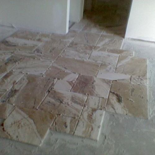 Laying French tile through out house...Reminds me 