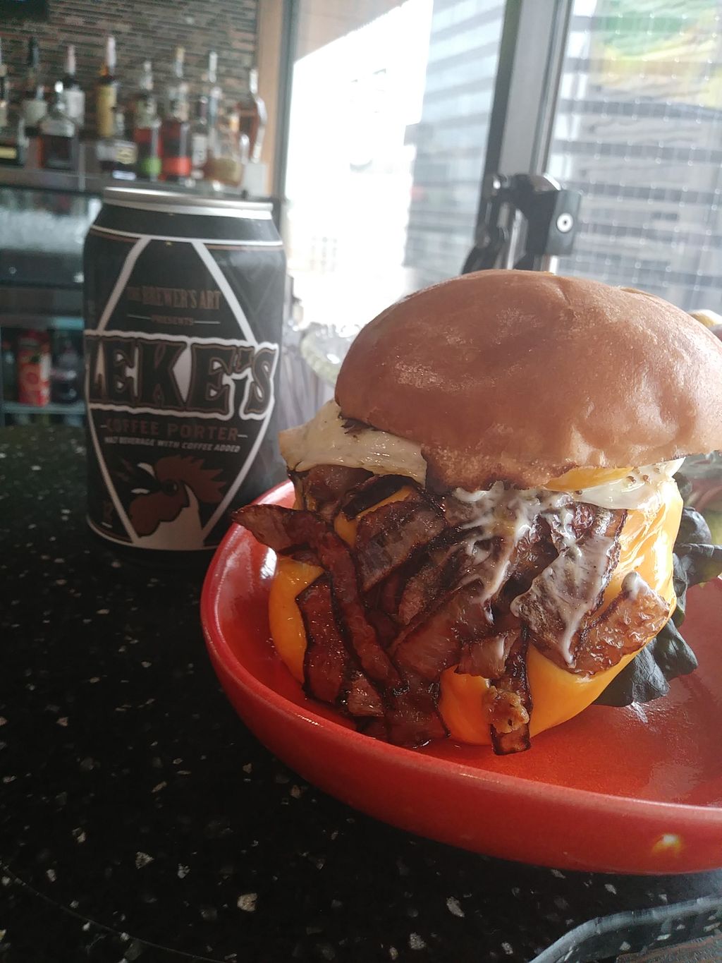 The Hangover Burger, bacon, sauteed onions, sunny 