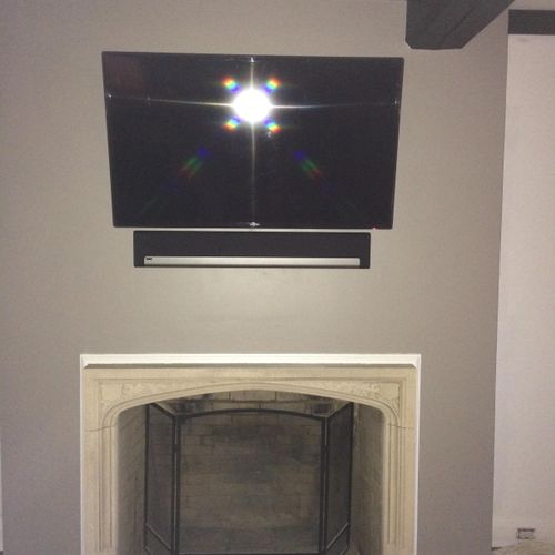 50" Samsung mounted above Fireplace. Sonos Sound B