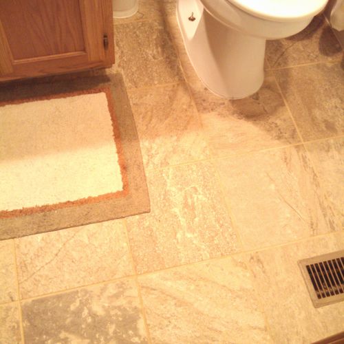 Bathroom remodel, tile flooring, new toilet instal