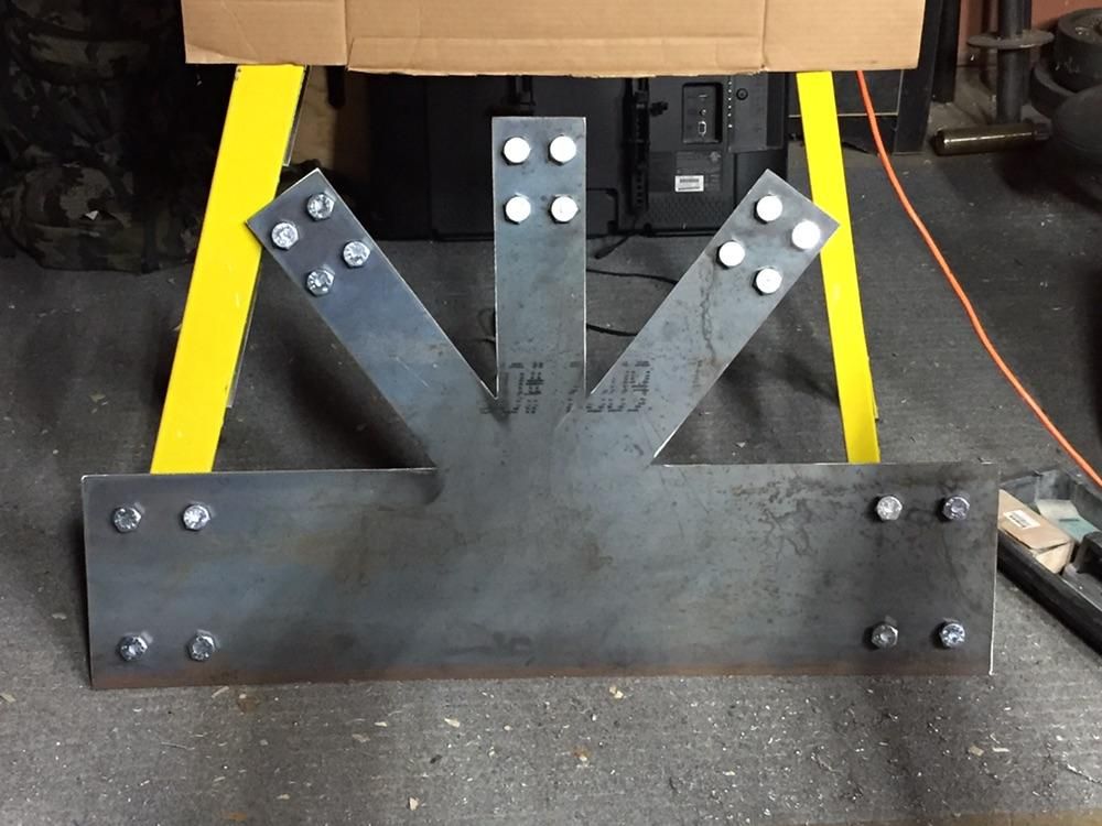 Truss brackets cleaned up and holes drilled, ready