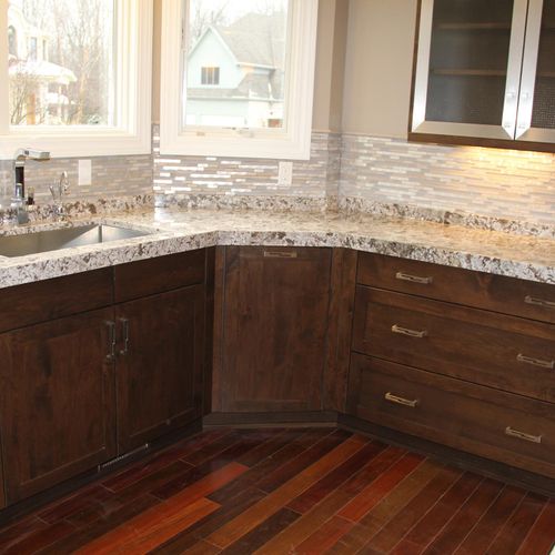 Kitchen cornering granite and sink with stone back