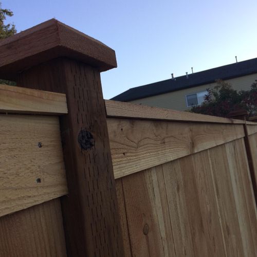 Wood fence average price 23-26 $ line ft. with mat