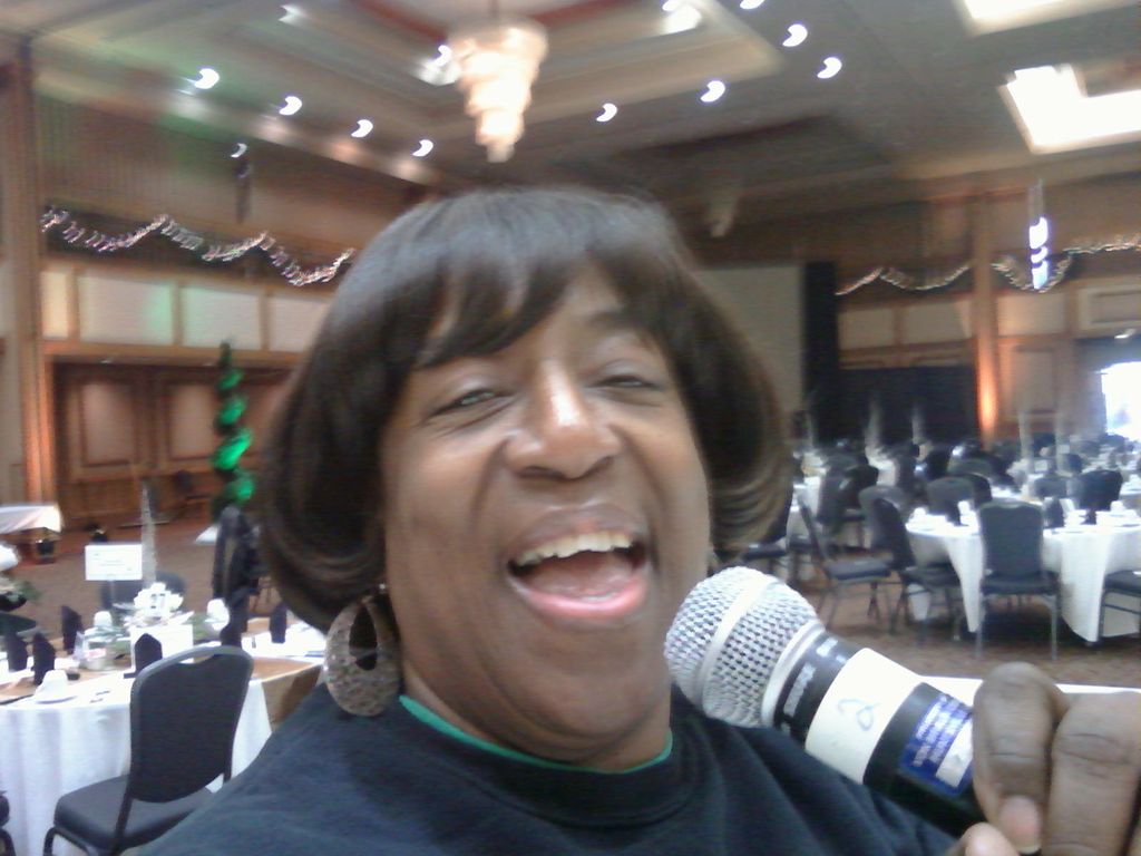 Angie during a warm-up session with the band UMOJA