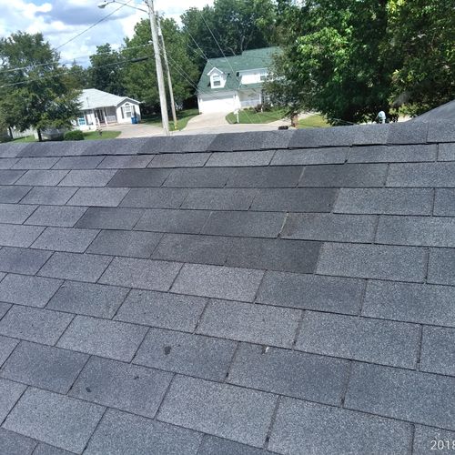 put  new  shingles  back  and  done.. 